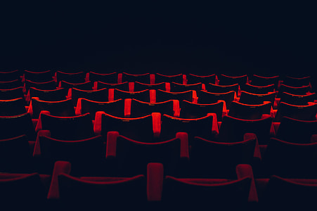 red and black theater chairs thumbnail