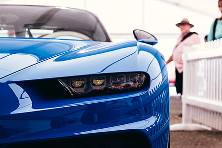 blue Chevrolet Camaro in closeup photography thumbnail