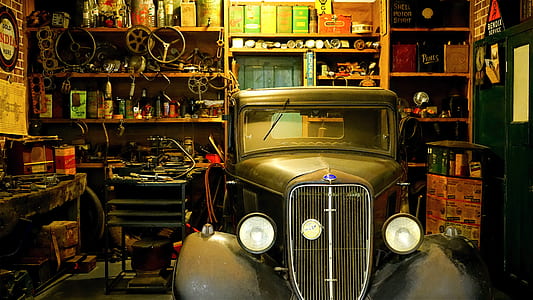 black car on garage thumbnail