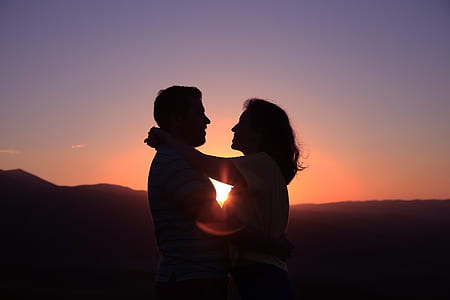 silhouette photo of man and woman thumbnail
