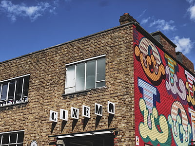 Cinema building under blue sky thumbnail