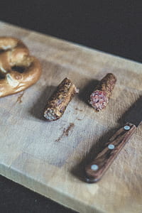 sliced food on chopping board with knife thumbnail