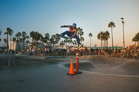person doing tricks on skateboard at skate park thumbnail