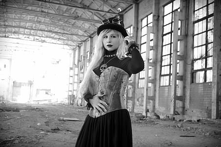 gray scale photo of standing woman thumbnail