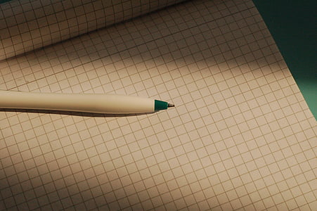 white pen on white graphing paper thumbnail