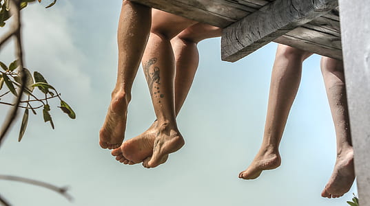 closeup photo of person sitting on chair thumbnail