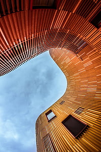 low angle of orange architectural building thumbnail