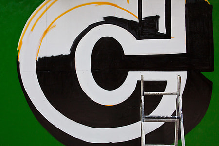Close-up shot of wet paint from a fresh street art piece in Shoreditch, East London thumbnail