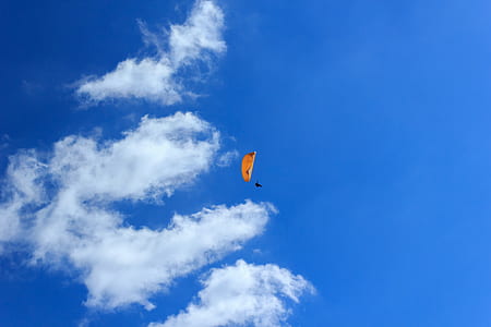 man paragliding low-angle photography thumbnail