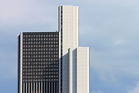 white and black concrete building at daytime thumbnail