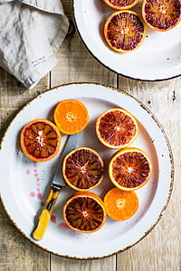 fruit slices on plate with knife thumbnail