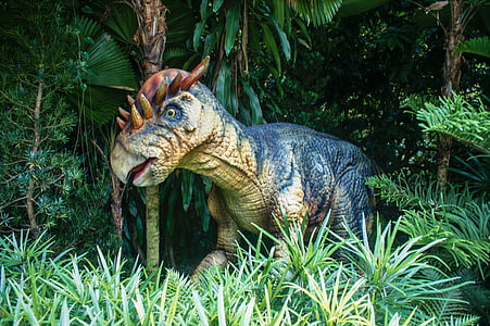 black and beige dinosaur toy thumbnail