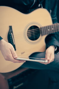 person holding white Android smartphone thumbnail