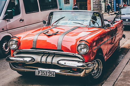 classic red convertible coupe parked on graytop road thumbnail