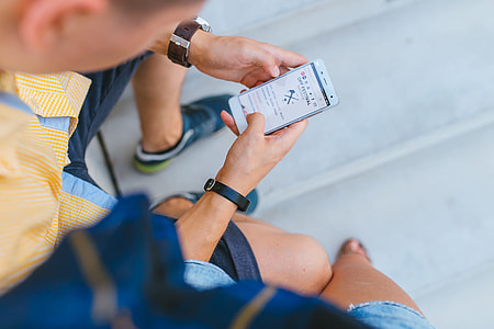 person hold white Android smartphone thumbnail