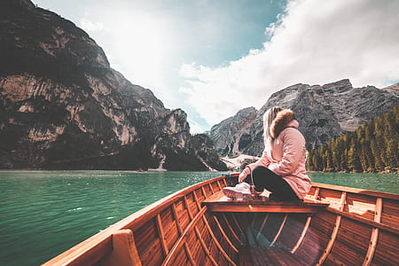Young Woman Relaxing on a Rowing Boat & Enjoying the Nature thumbnail