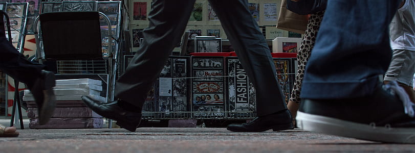person wearing dress pants and pair of black leather shoes walking on street at daytime thumbnail