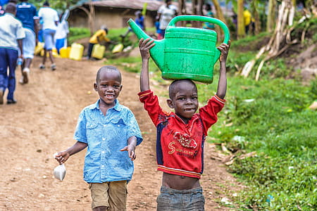 Two Boys Walking Beside the Grass thumbnail