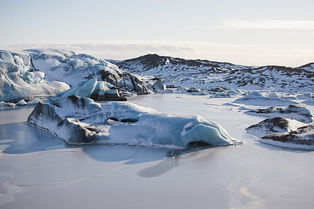 snow covered mountain under white sky during daytime photo thumbnail