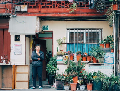 man standing near the doorway thumbnail