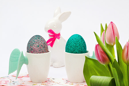 white ceramic rabbit figurine and two gray-and-green egg decors on white ceramic winged mugs thumbnail
