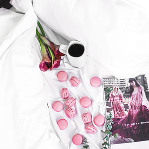 pink macaroons on white textile thumbnail