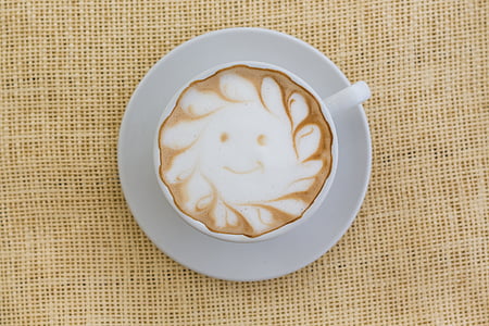 white ceramic cup with coffee latte thumbnail