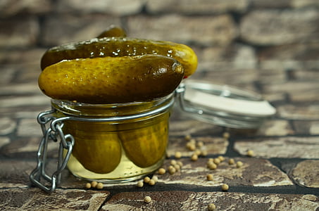 clear glass jar with cucumber thumbnail