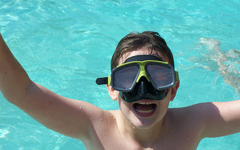 boy wearing goggles in pool thumbnail