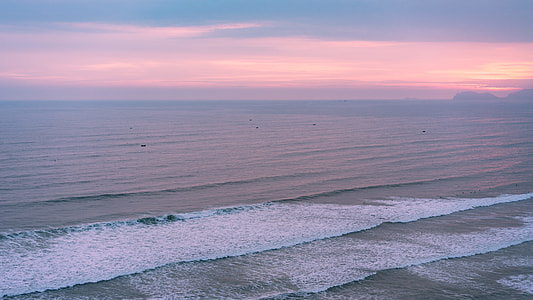 photo of sea waves during golden hour thumbnail