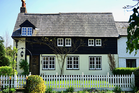 white and black 2-storey house thumbnail