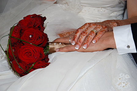 coupe holding hands on woman's lap thumbnail