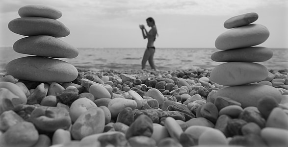 grayscale photo of woman at seashore thumbnail