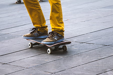person riding on skateboard at daytime thumbnail