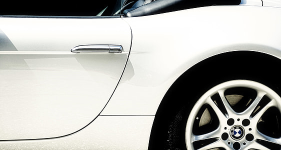closeup photo of white vehicle thumbnail