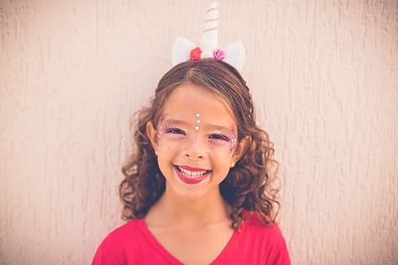 brown haired girl in red top wearing makeup thumbnail