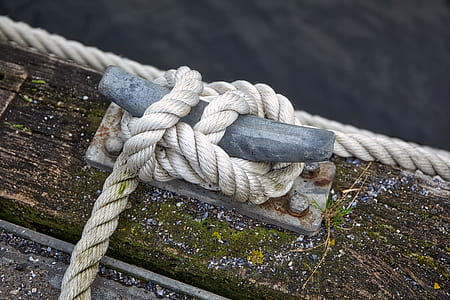 white rope knotted on gray hook thumbnail