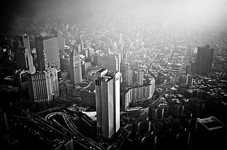 greyscale photography of city thumbnail