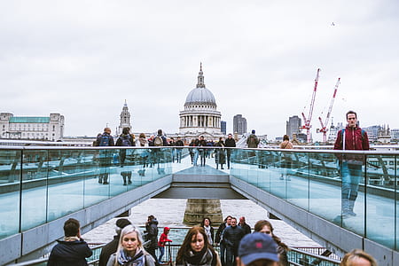 group of people walking on bridge thumbnail