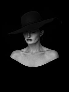 greyscale photo of woman wearing off-shoulder dress and sunhat thumbnail