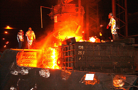 photography of men working at industrial plant thumbnail