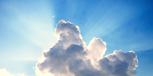 light rays passing through heavy gray cloud photography thumbnail