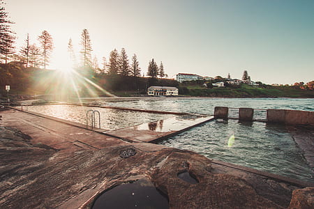 swimming pool during golden hour thumbnail