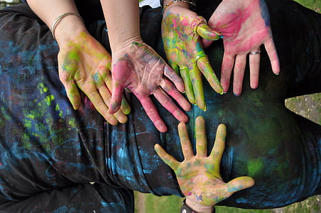 person hand drenched with paint thumbnail