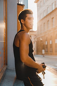 man wearing black tank top thumbnail