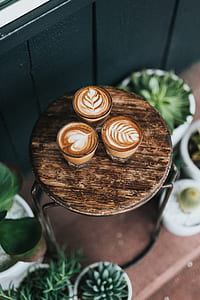 three assorted frappes on brown table thumbnail