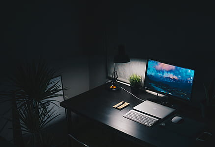 turned on computer monitor on table thumbnail