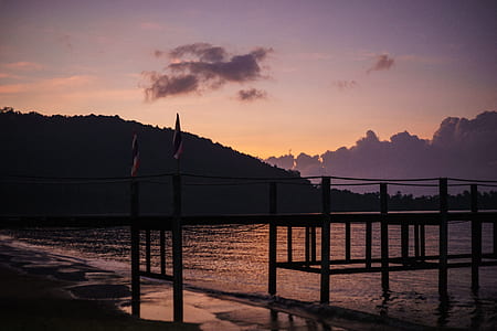 two multicolored flags on dock thumbnail