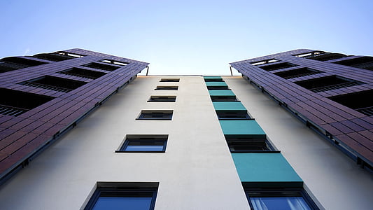 worm's eyeview photography of high rise building thumbnail