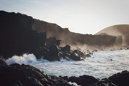 rocks near body of water thumbnail